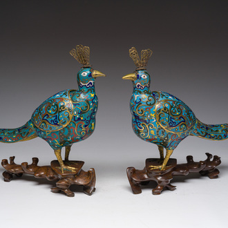 A pair of Chinese cloisonné peacock-shaped censers and covers, 19th C.
