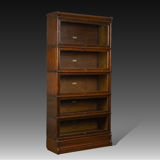 An English five-piece oak Global Wernicke modular or barrister's bookcase, early 20th C.