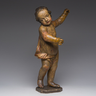 A gilt and polychrome wooden sculpture of a putto, 18th C.