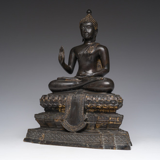 A Thai bronze sculpture of the seated Buddha with traces of gilding, Rattanakosin, 18th/19th C.