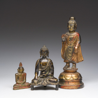 Three gilt-lacquered bronze Buddha sculptures, Korea, Tibet and Sri Lanka, 19th C.