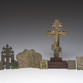 A varied collection of Russian orthodox partly enameled mostly bronze travel icons and icon crosses, mainly 18th/19th C.