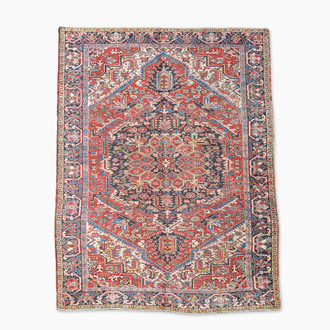 Tapis oriental de type Heriz à décor floral, laine sur coton, 20ème siècle