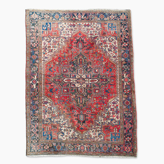 Tapis oriental de type Heriz à décor floral, laine sur coton, 20ème siècle