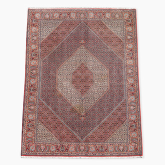 Tapis oriental de type Bidjar à décor floral, laine sur coton, 20ème siècle