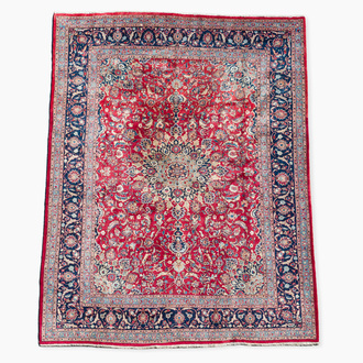 Tapis oriental de type Keshan (Kashan) à décor floral, laine sur coton, 20ème siècle