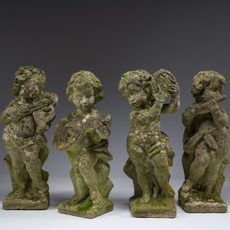 Quatre putti musiciens en pierre reconstituée, 20ème siècle