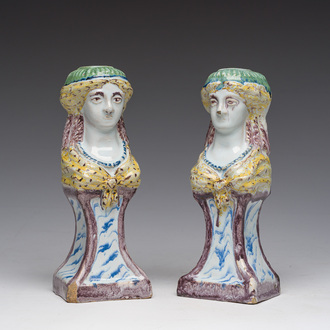 A pair of polychrome pottery women's busts, North of France, 18th C.