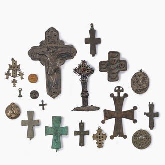 A varied collection of devotionalia incl. crucifixes, reliquaries, stamps and pendants in mostly bronze and silver, probably 10th C. b.C. and later