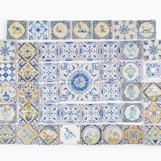 53 blue, white and polychrome Dutch Delft tiles with animals, flowers and ornamental designs, The Netherlands, 16th/17th C.