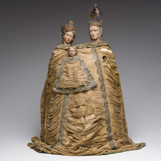 A Spanish carved and polychrome decorated wooden group of the Virgin and Child with Saint Anne with fabric covering, late 18th C.