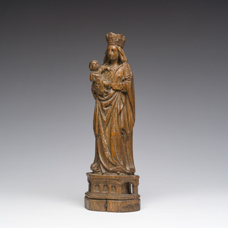 A Gothic revival carved oak Madonna and Child modeled after 15th-C. Utrecht clay models, 19th C.