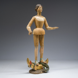 A polychrome and carved wooden figure of the Virgin of the Apocalypse, 19th C.