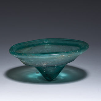 A Byzantine glass oil lamp, possibly 5th/10th C.