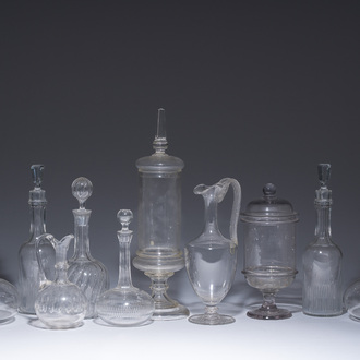 A varied collection of eight carafes and two bonbonnières in glass and crystal, 19th/20th C.
