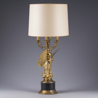 A Hollywood Regency lamp with a gilt eagle, Deknudt, Courtrai, third quarter 20th C.