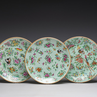 Three Chinese Canton famille rose celadon ground plates with birds, butterflies and flowers, 19th C.