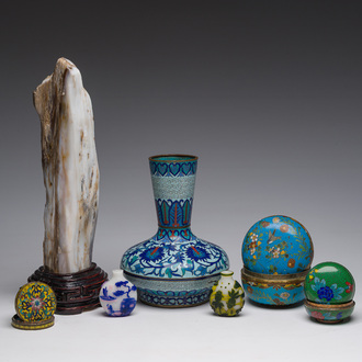 Three Chinese cloisonné boxes and covers, a vase, two multilayered glass snuff bottles and a 'gongshi' stone or scholar's rock, 19th/20th C.