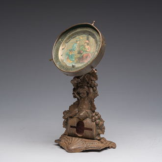 Roulette de comptoir en laiton sur un support en métal à décor de Bacchus sur un tonneau, vers 1900