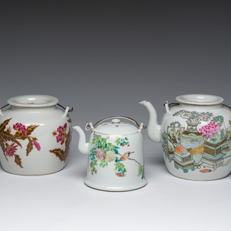 Three Chinese famille rose and qianjiang cai teapots and covers with floral design and antiquities, 19th/20th C.