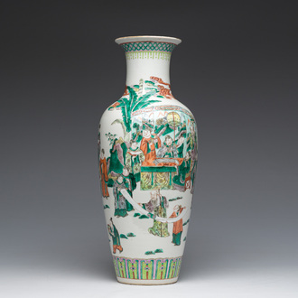 A Chinese famille verte vase with Immortals and their servants in a palace garden, Kangxi mark, 19th C.