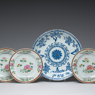 A Chinese blue and white dish and three famille rose plates with floral design, Kangxi/Qianlong