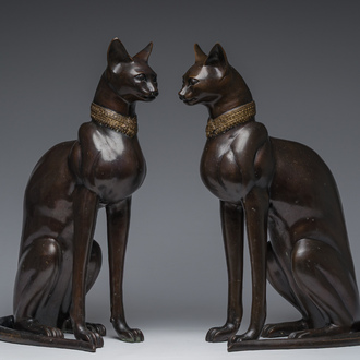 A. Tiot (20th/21st C.): A pair of Bastet statues, brown patinated bronze