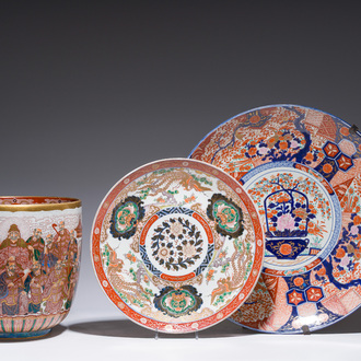 Two Japanese Imari 'fauna and flora' dishes and a ko-Kutani style 'one hundred faces' jardinière, marked Kutani Akiyama, Meiji, 19th/20th C.