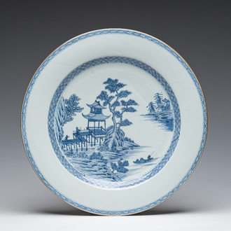 A Chinese blue and white dish with an animated river landscape, Qianlong