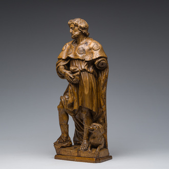 A French carved limewooden 'Saint Roch and his dog' group, 18th C.