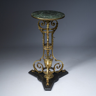 A Napoleon III style gilt bronze tripod sidetable on a black marble base and with a green marble top, early 20th C.