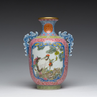 A Chinese falangcai vase with birds among blossoming branches, Qianlong mark, 20th C.