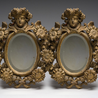 A pair of French gilt and carved wooden 'sunflower' mirrors, 18th C.