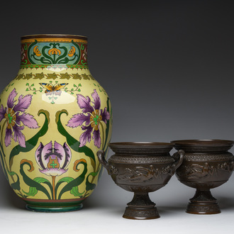 A Sarreguemines yellow-ground Art Nouveau vase with floral design and a pair of patinated bronze urns with 'nymphs' relief design, 20th C.
