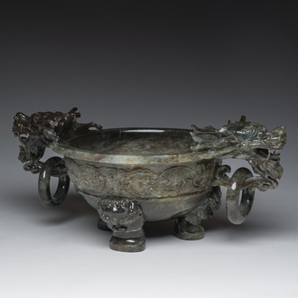 A Chinese tripod green jade 'dragon heads' incense burner, 20th C.