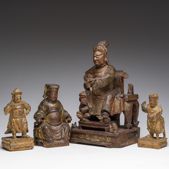 Four Chinese partially gilt and lacquered wooden 'Immortals' figures, a.o. Guandi, Qing