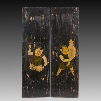 Two black lacquered and polychrome decorated wooden doors with boys holding a vase and a censer, Tibet, 19th C.
