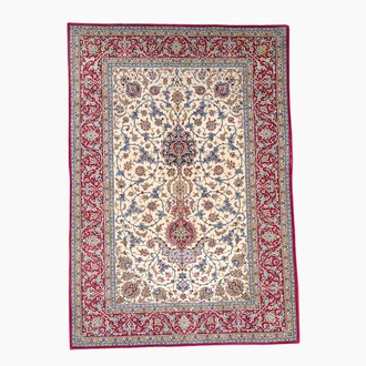 A Persian Isfahan rug with floral design, wool and silk on silk, 20th C.