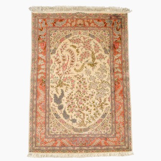 A Persian Qom (Qum/Ghom) silk rug with floral design, signed Mirmehdi, 20th C.