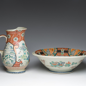 A Japanese Kutani pitcher and matching washbasin with floral design and landscapes, Meiji, 19th C.