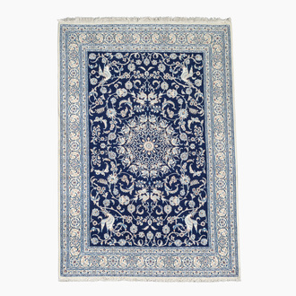 A Persian Isfahan rug with Nain design, wool and silk on silk, 20th C.