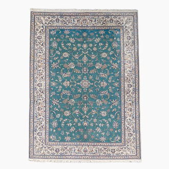 A Persian Habibian Nain rug with floral design, wool, cotton and silk, 20th C.