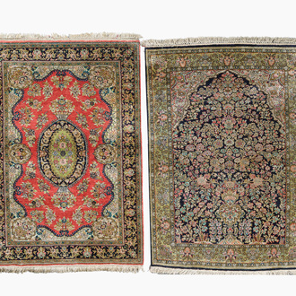 Two Persian Qom (Qum/Ghom) silk rugs with floral design, 20th C.