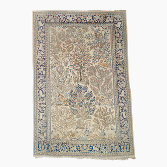A Persian Qom (Qum/Ghom) rug with floral design and animals, wool on cotton, 20th C.