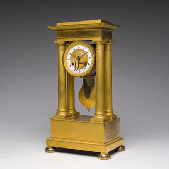 A French gilt bronze portico clock, 19th C.