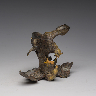 A Viennese polychrome cold painted bronze group of two fighting eagles, 19th/20th C.