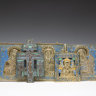 Two Russian orthodox partly enamelled bronze travel icons and an icon cross, 19th/20th C.