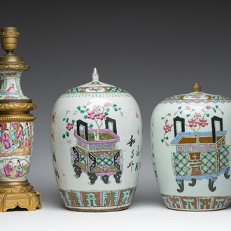 Two Chinese famille rose 'flower baskets' jars and covers and a Canton vase mounted into a lamp, 19th C.