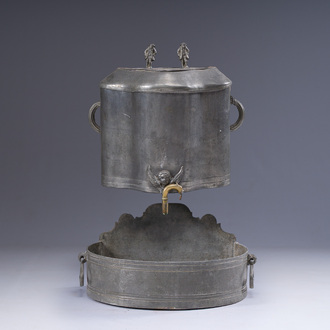 A German pewter water fountain crowned with two figures, late 17th C.