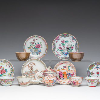 Six Chinese famille rose and gilt cups and saucers and a cream jug with floral and mandarin design, Yongzheng/Qianlong